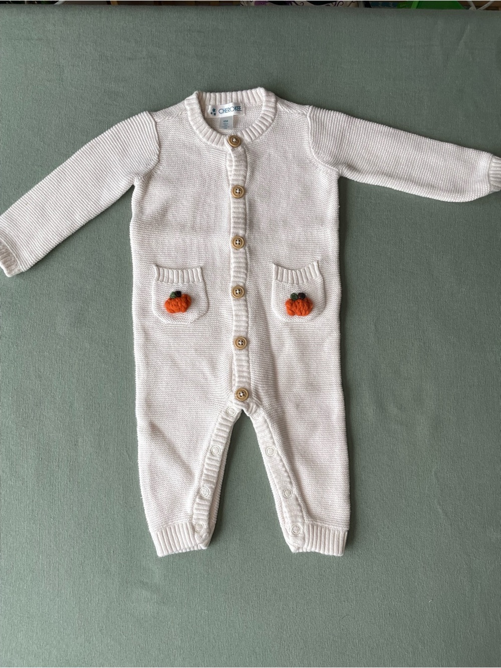 Upcycled Cream Knit One-Piece with hand stitched Pumpkin Pocket Accents